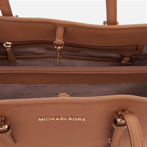 michael kors jet set east west large leather tote bag|Michael Kors jet set airplane.